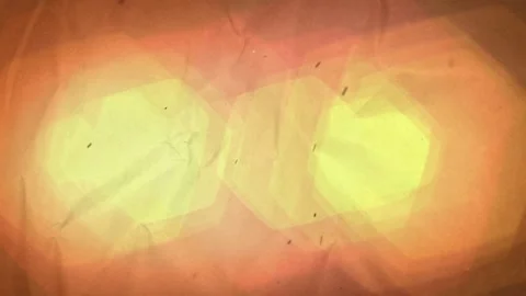 Large Yellow Hexagonal Shapes With Black Falling Particles Motion Background Stock Footage 143129881