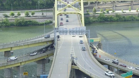 Large Yellow Highway Bridge Underneath City Neighborhood Stock Footage 79862160