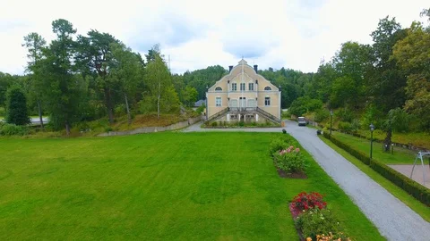 Largest castle in Stockholm nice view and green drone film Stock Footage 129865817