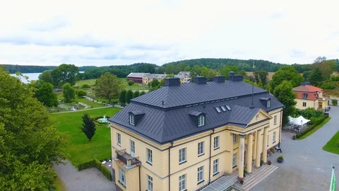 Largest castle in Stockholm nice view and green drone film Stock Footage 129865984