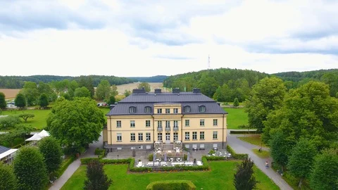 Largest castle in Stockholm nice view and green drone film Stock Footage 129866808