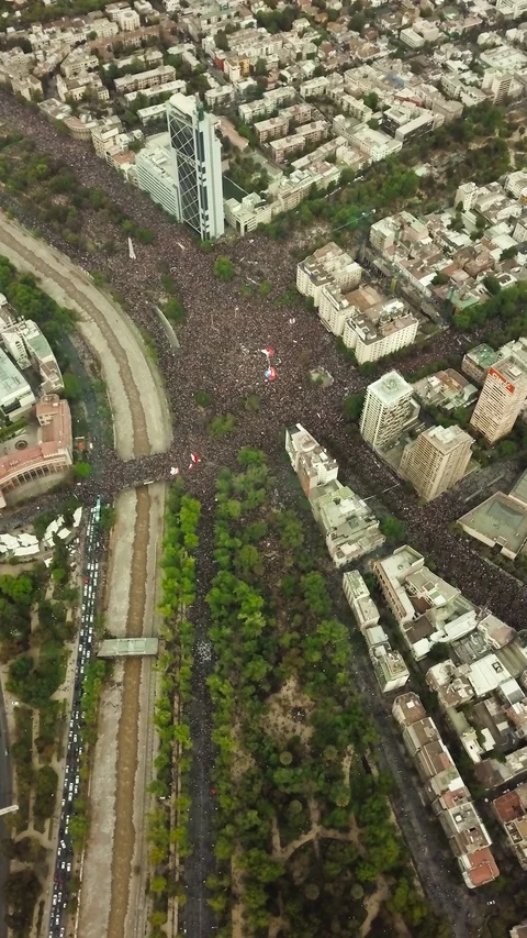 Largest Protest Crowd Chile 1.2 millions people march riots biggest cro portrait Stock Footage 118717709