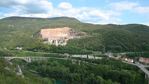 Largest stone bridge in the world Solkan Bridge and quarry over town in Slovenia Stock Footage 138446786