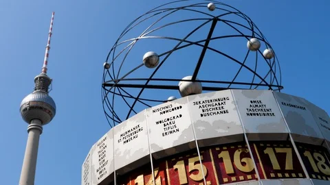 Largest world clock in the world Alexanderplatz, pan to Berlin TV Tower Stock-Footage 116246261