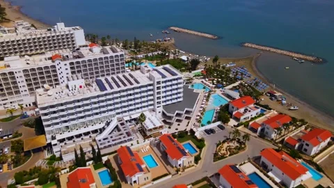 Larnaca , Cyprus - 03 05 2025: Summer view from above on a coastal hotel Stock Footage 309398566