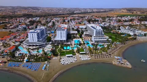 Larnaca , Cyprus - 03 05 2025: Summer view from above on a coastal hotel 스톡 동영상 309400443