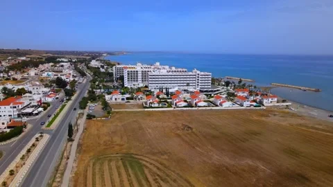 Larnaca , Cyprus - 03 05 2025: Summer view from above on a coastal hotel Stock Footage 309401814