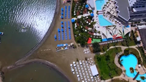 Larnaca , Cyprus - 03 05 2025: Summer view from above on a coastal hotel Stock Footage 309402479