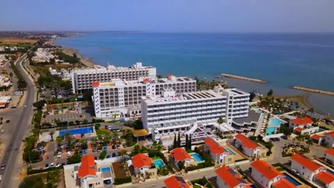 Larnaca , Cyprus - 03 05 2025: Summer view from above on a coastal hotel Stock Footage 309405642