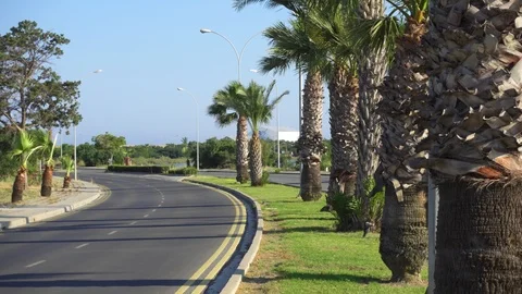 LARNACA, CYPRUS - CIRCA May 2019: Unrecognizable cars driving along street with Video stock 114133507