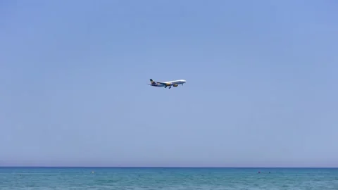 LARNACA, CYPRUS - CIRCA May 2019: Thomas Cook airplane fly in blue sky. Plane Stock Footage 150263371