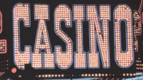 Las Vegas - 1964: A big casino neon light sign of Pioneer Club at night Stock Footage