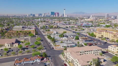 Las Vegas Aerial Pullback View of Strip Skyline Over Urban Neighborhood 02 Video stock 334684498
