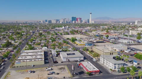 Las Vegas Aerial Pullback View of Strip Skyline Over Urban Neighborhood 01 Video stock 334684585