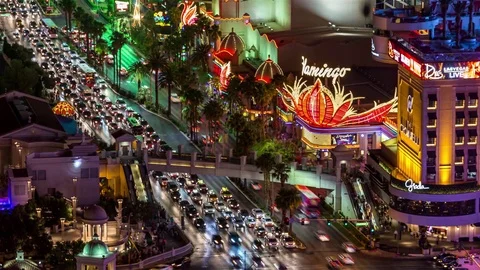 Las Vegas Boulevard The Strip at Night with Flamingo Hotel Timelapse Stock Footage