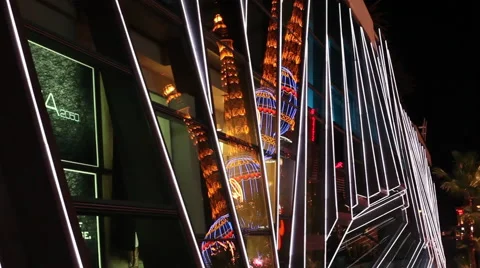 LAS VEGAS - EIFFEL TOWER PARIS BALLOON REFLECTING IN NEON GLASS Stock Footage 40712008