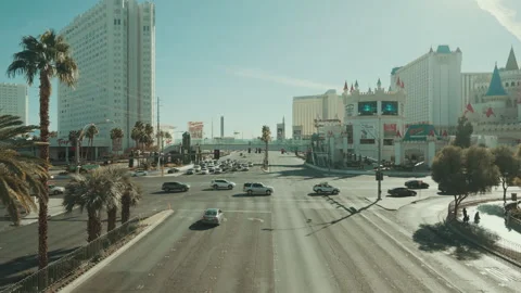 Las Vegas Strip intersection traffic by a castle themed casino Video stock 347836345