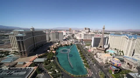 Las Vegas strip wide shot day to night time-lapse timelapse water fountain Stock Footage