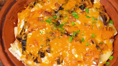 Lasagna close-up, sprinkled with greenery Stock Footage 248986751