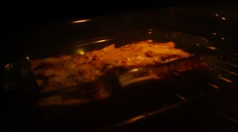 Lasagna Cookin in Oven Stock Footage 41309314