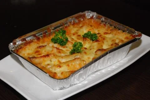 Lasagna in the foil Stock Photos