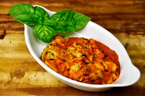 Lasagna with fresh basil Foto stock