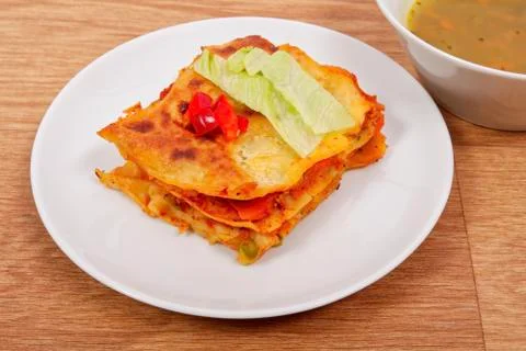 Lasagna with vegetables on a table Stock Photos