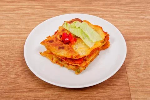 Lasagna with vegetables on a table Foto stock