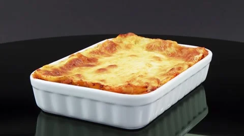 Lasagne in a baking dish Stock Footage 8571503