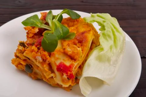 Lasagne with cauliflower on a table Stock Photos