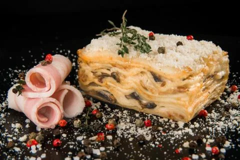 Lasagne on a dark background Stock-Fotos