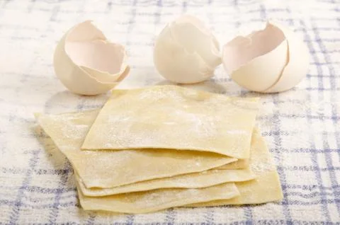 Lasagne sheets on a kitchen towel Stock Photos