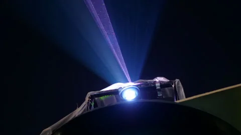 A laser beam illuminates the night sky. Laser installation against the Stock Footage 172427203