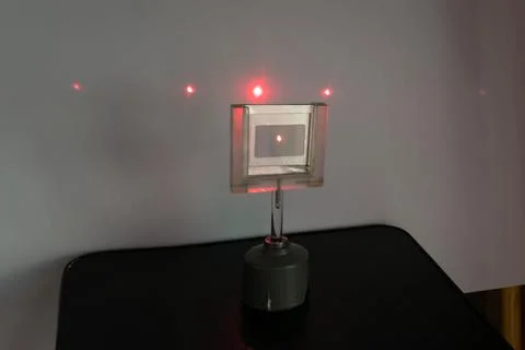 Laser Beam through Grid Stock Photos
