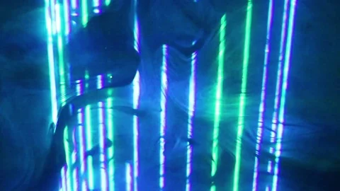 Laser beams are moving around in the smoke screen. Stock Footage 69719247