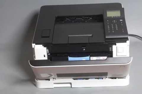 Laser color printer on gray background Foto stock