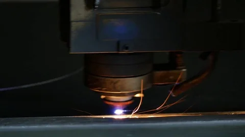 Laser cut machine while cutting the sheet metal with sparks and high precision Stock Footage 77831443