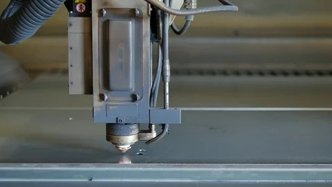 Laser cut machine while cutting the sheet metal with sparks and high precision Stock Footage 77831456