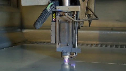 Laser cut machine while cutting the sheet metal with sparks and high precision Stock Footage 77831717