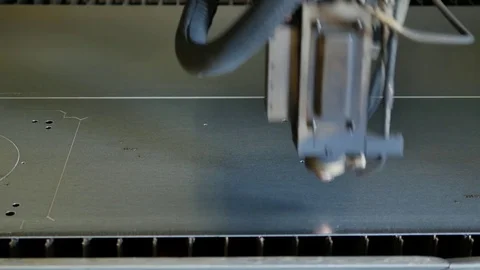 Laser cut machine while cutting the sheet metal with sparks and high precision Stock Footage 77832078