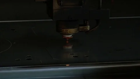 Laser cut machine while cutting the sheet metal with sparks and high precision Stock Footage 77832101
