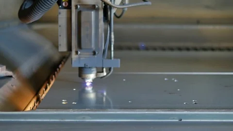 Laser cut machine while cutting the sheet metal with sparks and high precision Stock Footage