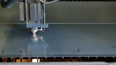 Laser cut machine while cutting the sheet metal with sparks and high precision Stock Footage 77832153
