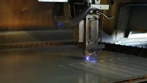 Laser cut machine while cutting the sheet metal with sparks and high precision Stock Footage 77832190