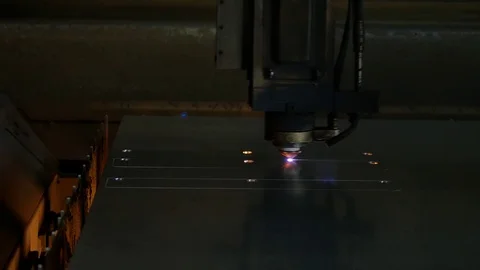 Laser cut machine while cutting the sheet metal with sparks and high precision Stock Footage 77832215