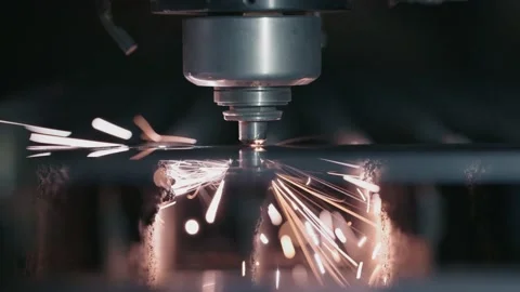 Laser cutter is cutting through sheet metal in slow motion Video stock 157100725