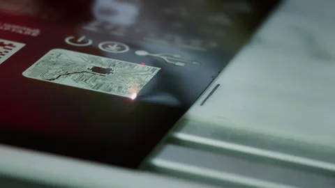 Laser cutting and engraving, application of keyboard layouts or circuit patterns Stock Footage 348228162