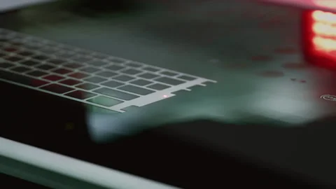 Laser cutting and engraving, application of keyboard layouts or circuit patterns Stock Footage 348235318