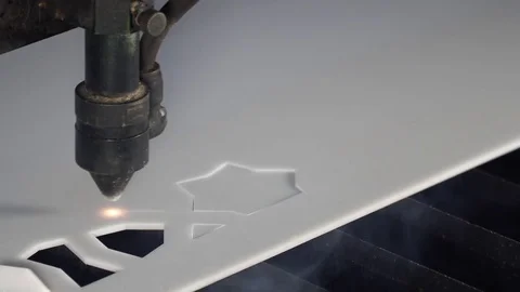 Laser cutting designed parts from plastic glass Stock Footage 82727485