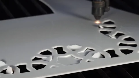 Laser cutting designed parts from plastic glass Stock Footage 82727608